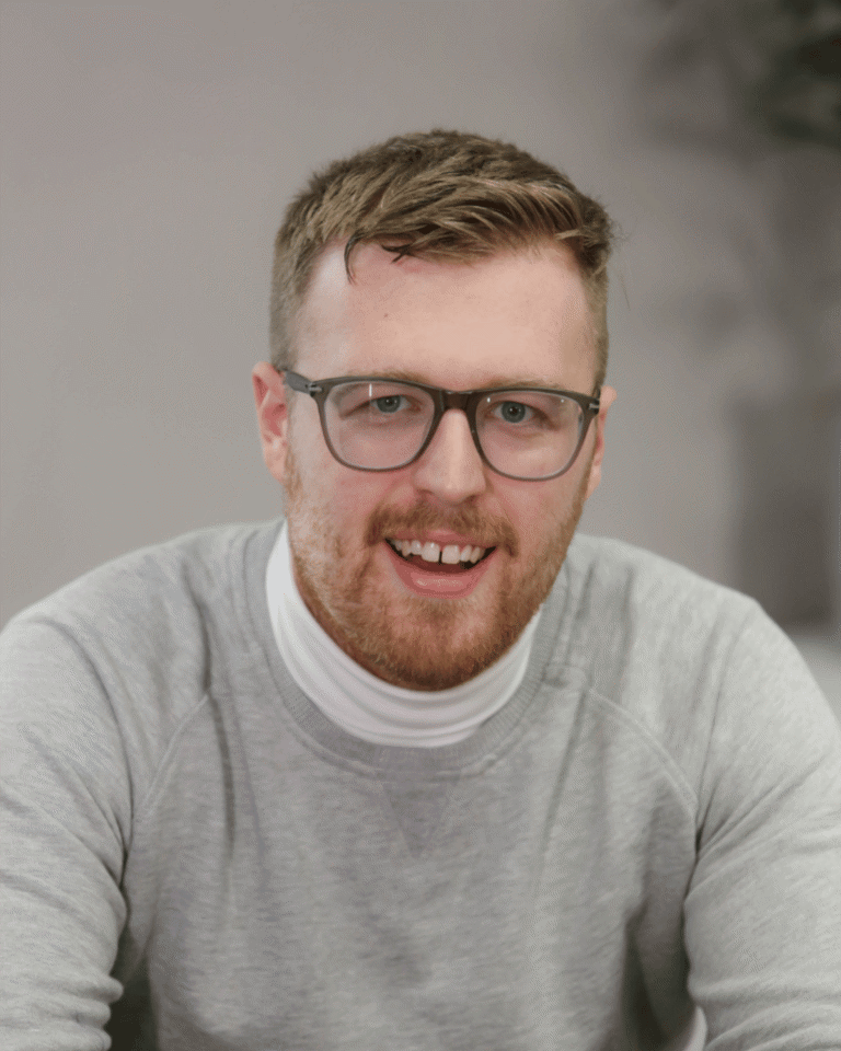 Headshot of Alex Simpson