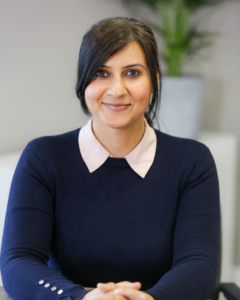 Headshot of Adila Malik